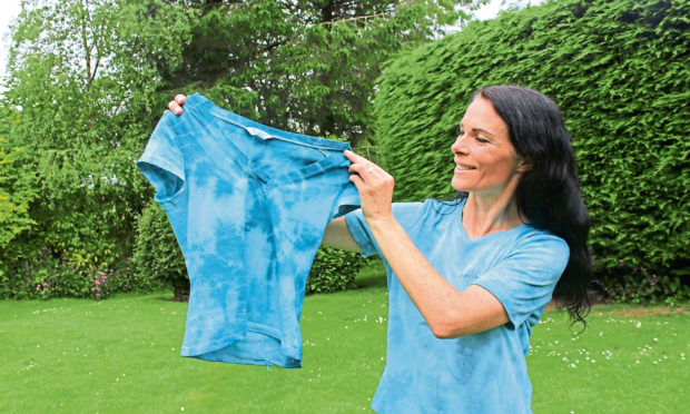 Gayle tie-dyed some old white T-shirts.