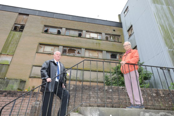 John Goodman and Ron Page have welcomed the announcement of work at the dilapidated building