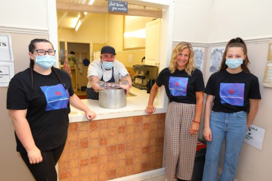 Chef Connor Taylor with volunteer helpers Sarah Robertson, Avril Muir and Ellie Muir.