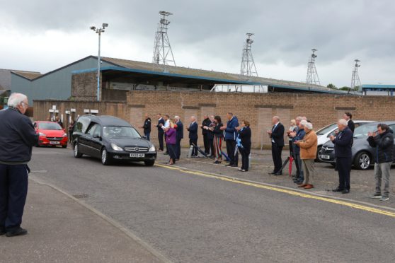 The hearse carrying Mr Farquhar stopped briefly outside Station Park.