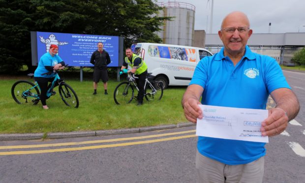 David Dorward, chairman of Dundee Bairns, with Genna Millar, project co-crdinator Dundee Bairns, Colin Murray, partner Nicholson's Cycles, and Scott Langslow, security officer at Michelin. Monday 22nd June 2020.
Dougie Nicolson / DCT Media.