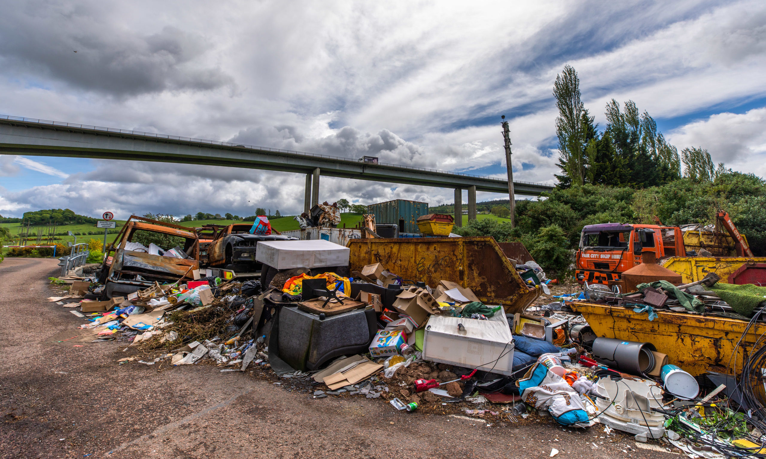 Fly-tipping under the Friarton Bridge in Perth