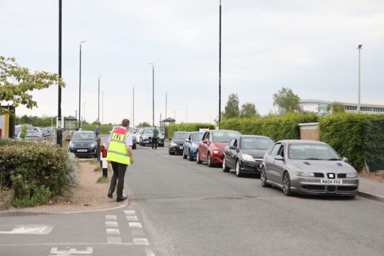 McDonald's in Monifieth reopens to massive queues.