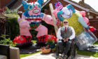 Disabled artist Jason Wilsher-Mills, who had been due to show his work at the Tate after winning the equivalent of the Turner Prize for disabled artists, has found new ways to work while self-isolating during the coronavirus pandemic by putting his giant inflatable sculptures on display in the back garden of his home in Sleaford, Lincolnshire. PA Photo. Picture date: Monday June 22, 2020. Photo credit should read: Jacob King/PA Wire