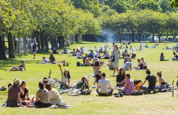 Crowds gather to enjoy Scotland's fine weather at the weekend, despite the social distancing requirements still in place.