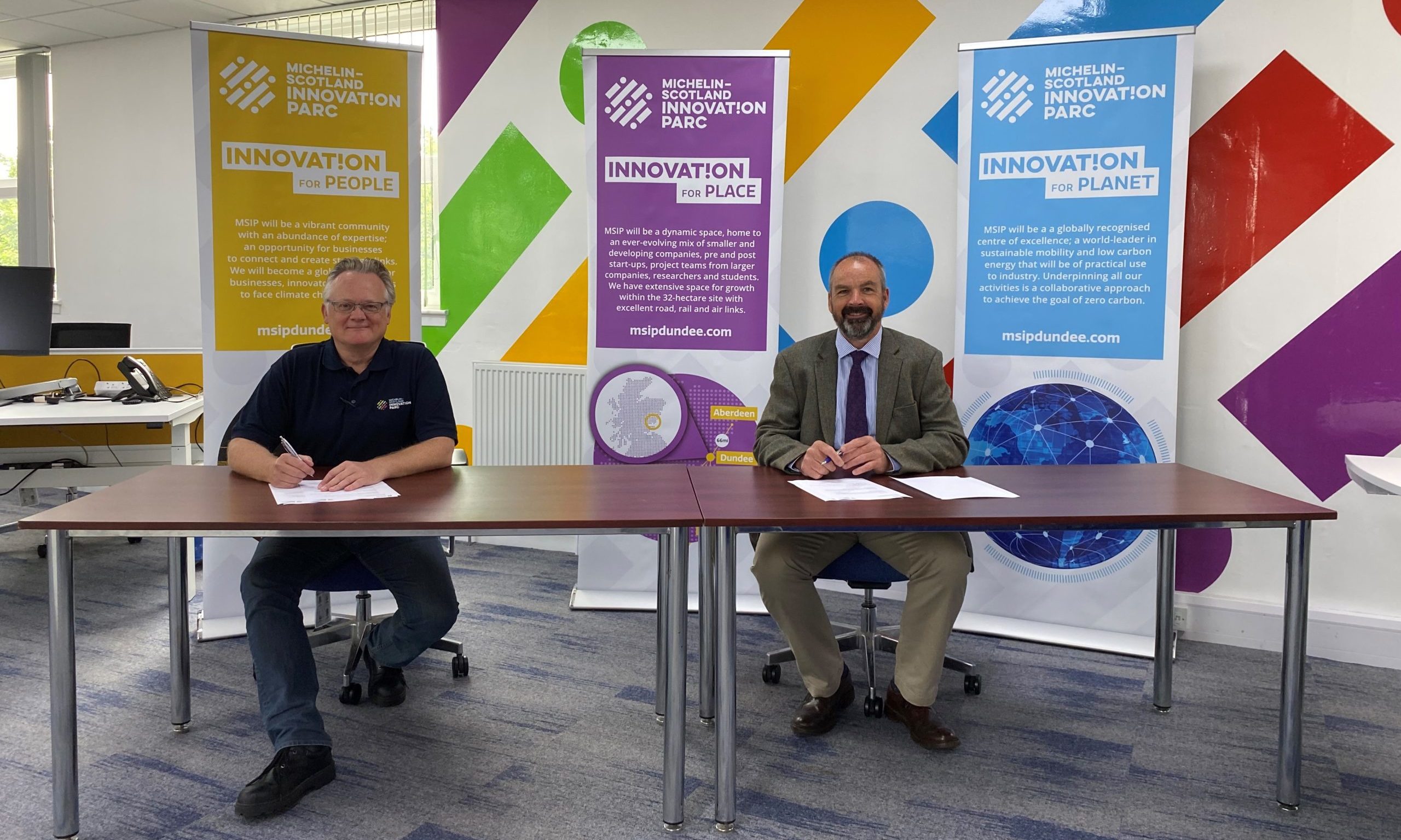 John Reid, MSIP chief executive and John Rowan from the University of Dundee sign a memorandum of understanding last month.