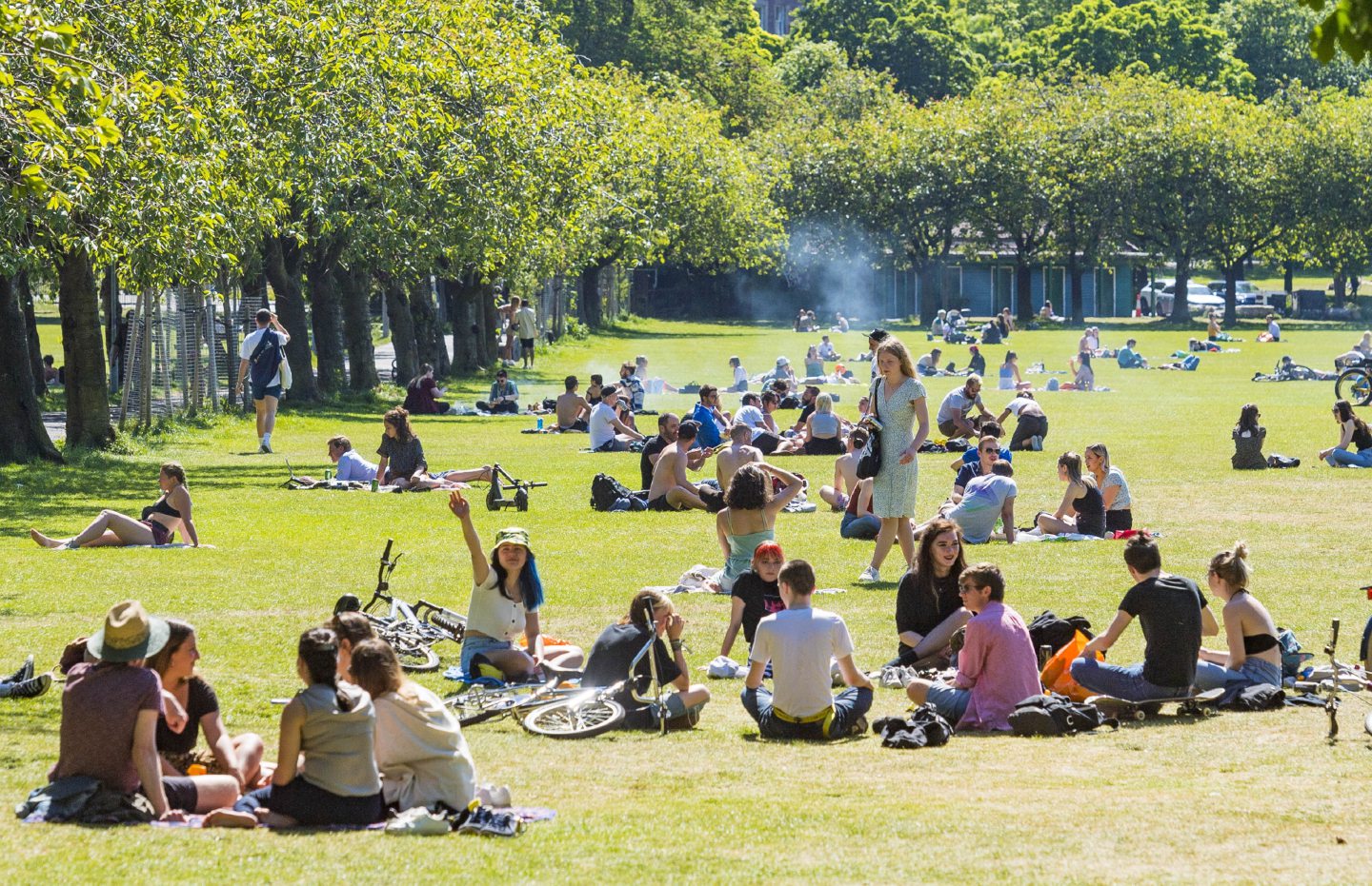 People gathered in the Meadows in Edinburgh after lockdown restrictions were eased.