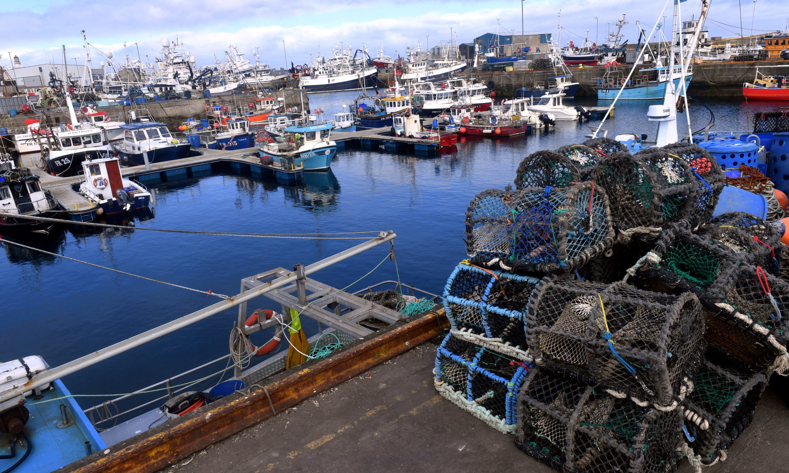 Moored fishing boats in Fraserburgh Harbour during lockdown.