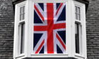 A Union Jack displayed in a window of an Aberdeenshire home.