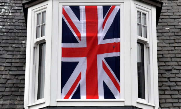 A Union Jack displayed in a window of an Aberdeenshire home.