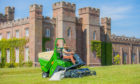 Lady Mansfield mowing the grass in June 2020, in preparation for the reopening of Scone Palace.