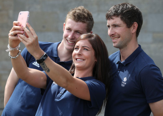 Eve with her brothers Thomas (left) and Glen when they were selected for the 2018 Winter Olympics.