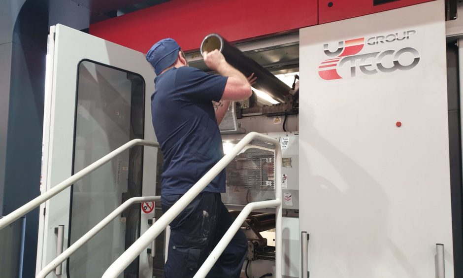 A member of staff prepares to print at Discovery Flexibles.