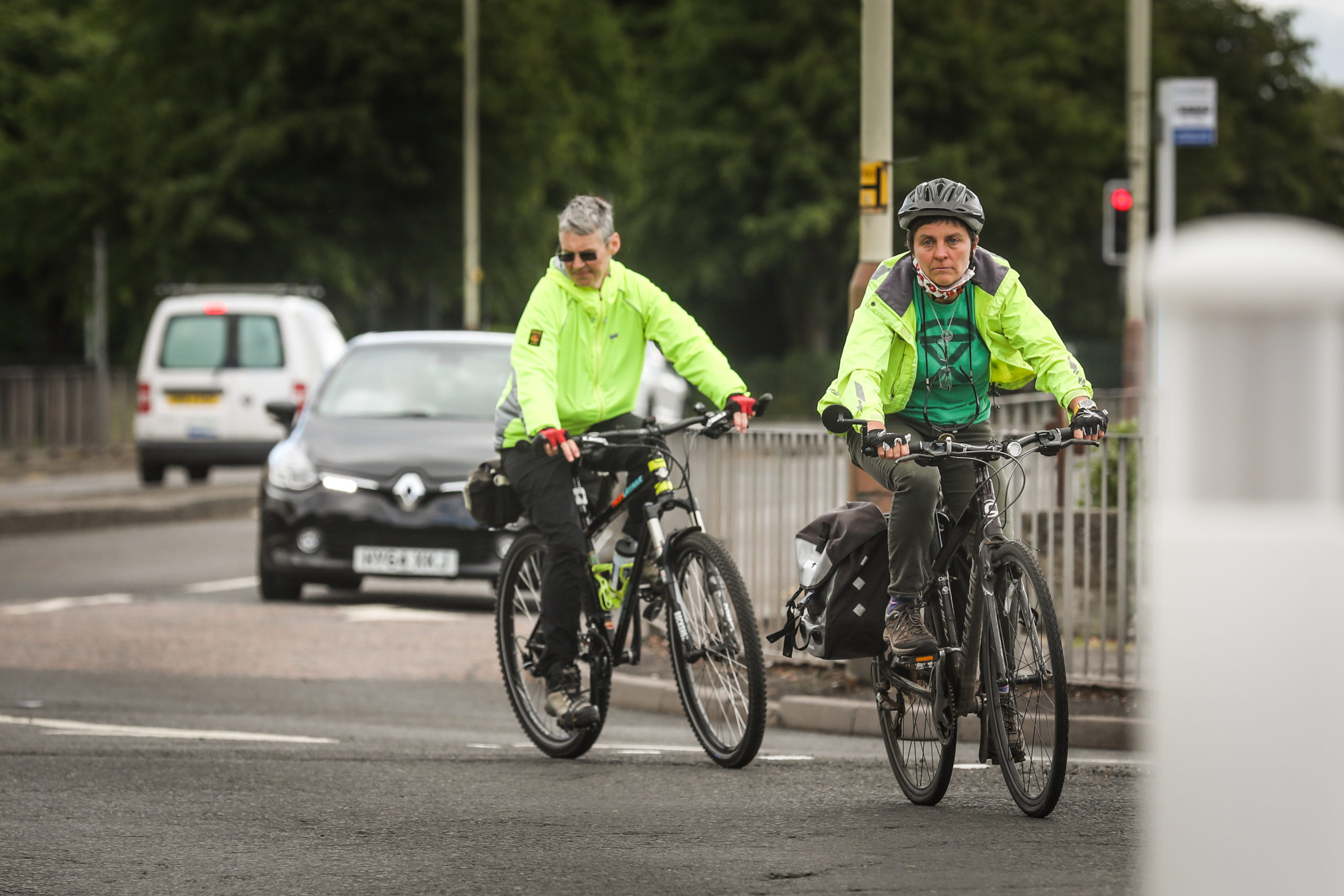 The Evening Telegraph, Impact News, CR0021633, Jon Brady story, Local cyclist and campaigner Kate Treharne and other cyclists are concerned about the troublesome road infrastructure at Harestane Road, at its roundabout junction with The Stack retail park. The road was changed earlier this year and has made cycling more dangerous as a result. Picture shows; Cyclist and campaigner Kate Treharne (front) rides along Harestane road with Gill Town. Wednesday 3rd June, 2020. Mhairi Edwards/DCT Media