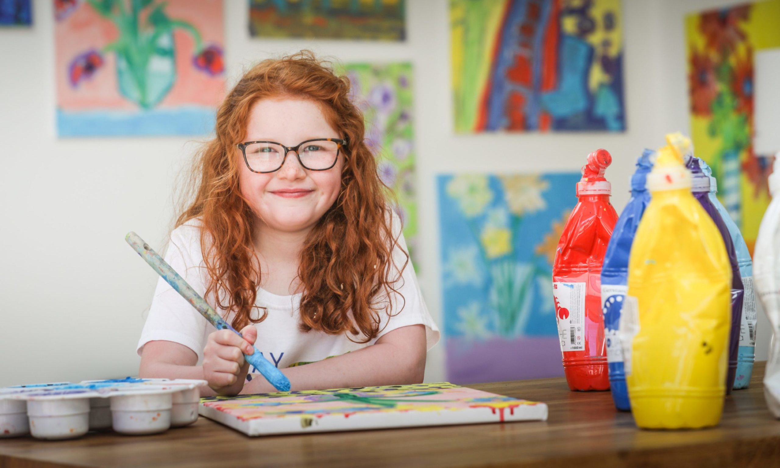 The Evening Telegraph, CR0021598, News, Lindsey Hamilton story, Budding artist Lauren Chesters, 7, has sold t-shirts she designed and has raised more than £600 for Dundee Bairns. Picture shows; Lauren Chesters, 7, doing what she does best. Saturday 30th May, 2020. Mhairi Edwards/DCT Media