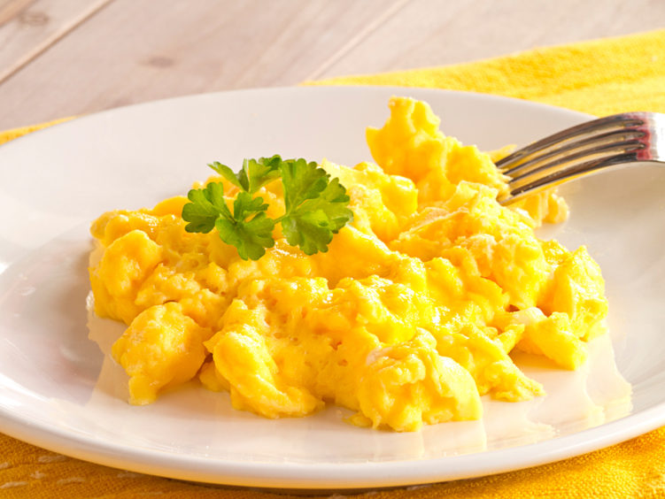 photo shows scrambled eggs on a plate.