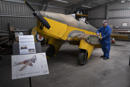 Volunteer Andy Lawrence with the rare Miles Hawk major at the heritage centre before lockdown.