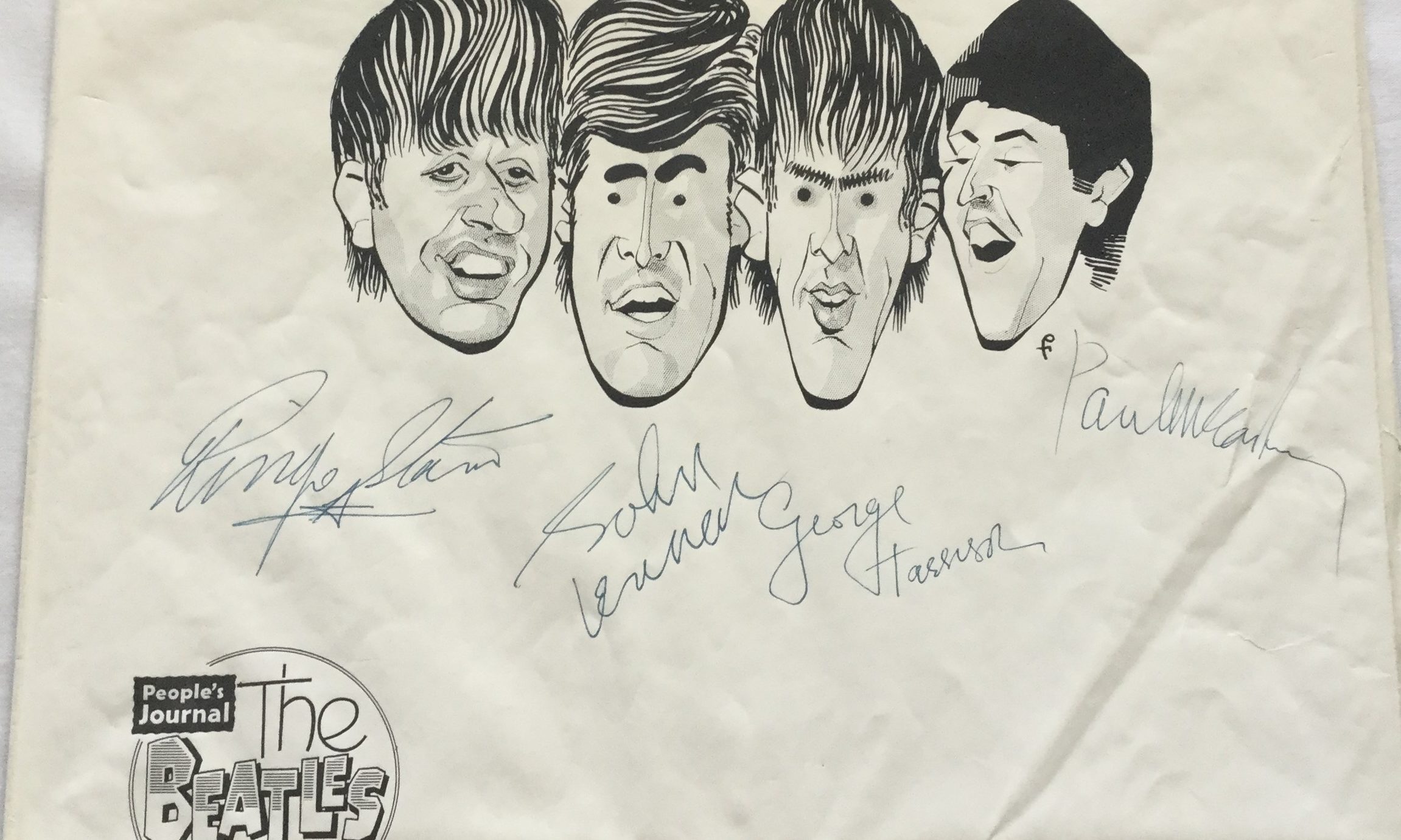 The autographed caricatures could fetch up to £15,000.