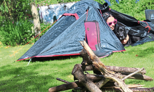 The Courier's Gayle Ritchie and her dog Toby set up a tent in the garden as part of  a Scouts Scotland "at home" challenge during lockdown