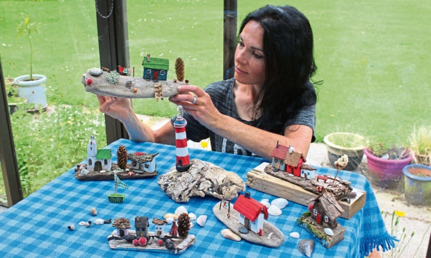 Gayle crafted her own driftwood village - cobbled together from seaside scraps found at Forvie Sands in Aberdeenshire.