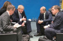 Boris Johnson (third left) speaks to Russian President Vladimir Putin (second right) during the International Libya Conference in Berlin, Germany, in January 2020.
