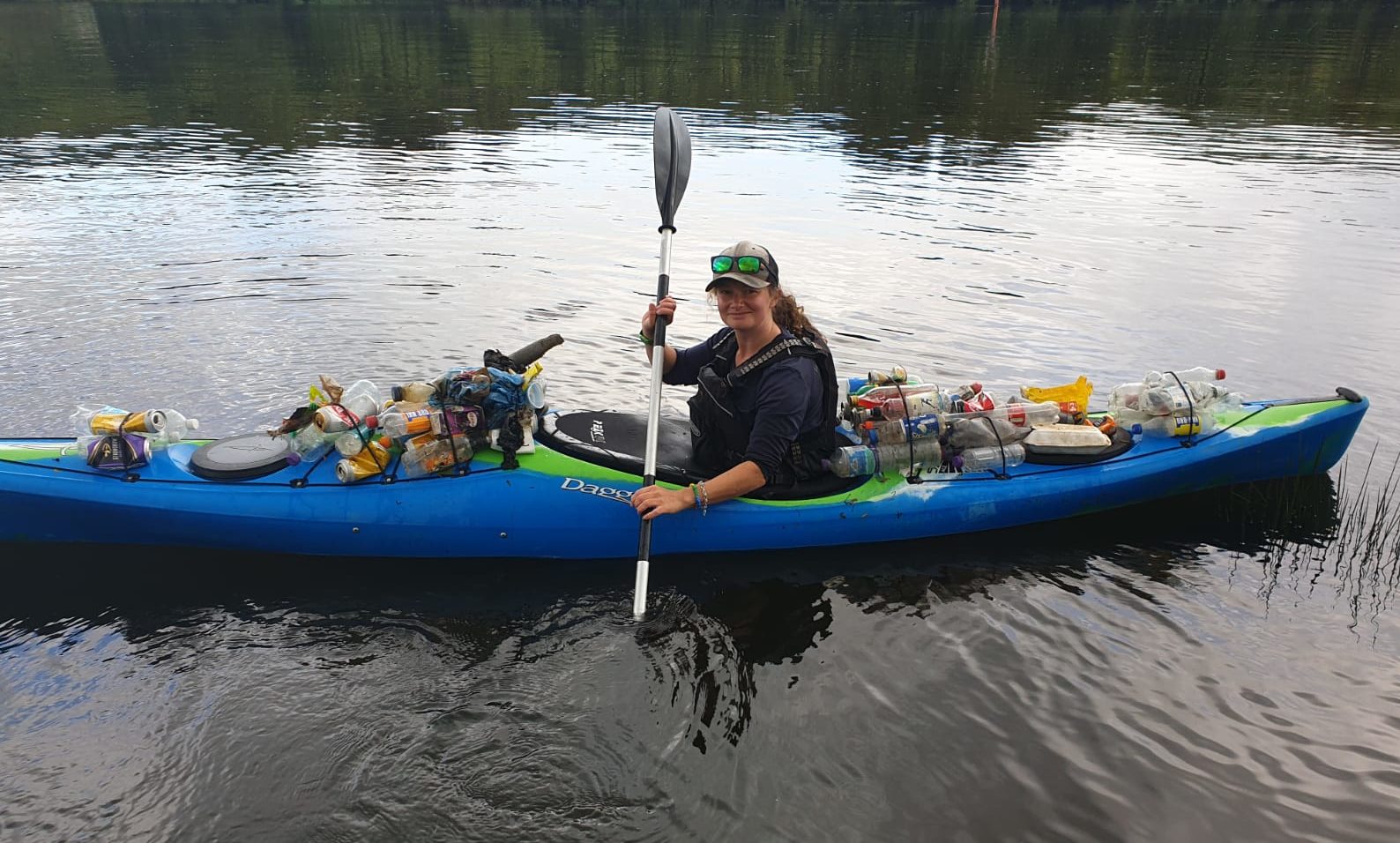 Emily Hamilton-Peach, assistant manager at Willowgate, with rubbish collected from the River Tay