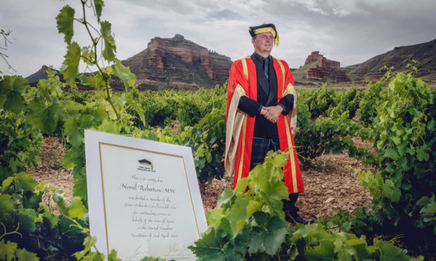 Norrel Robertson from Forfar has become a Knight of the Grand Order of Spanish Wine.
