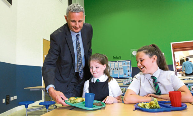 The task of delivering meals to pupils once schools return full time in August will be "challenging" according to Gary Conway