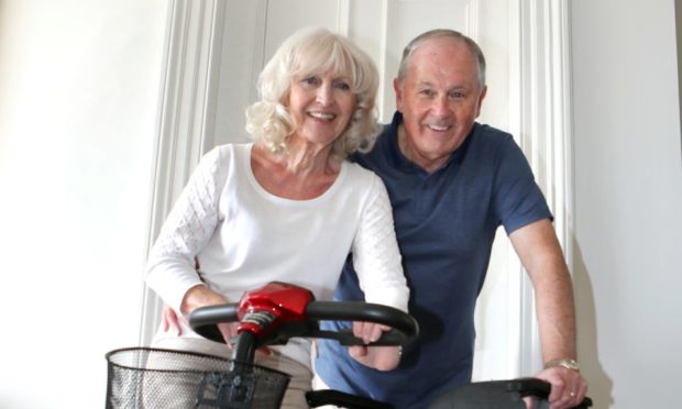 Tilda & George Bradley with Marion's new mobility scooter.