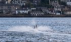 A jet-skier heading out from Broughty Ferry. There are complaints that some of the enthusiasts are ignoring rules around where they are allowed to operate their crafts.