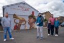 Stuart, Jordan and Craig Lowe (with his daughters Alysha,10,  and Rebecca, 6, with the mural of their brother Paul Lowe.