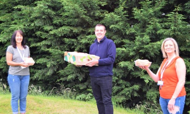 Kettle Produce makes stew pack donation to Fife Gingerbread. (L-R) Sandra Kennedy – Fife Gingerbread, Peter Strange – Development Production Manager, Kettle Produce and Zoe Taylor - Community and Inclusion Development Co-ordinator, Fife Gingerbread.