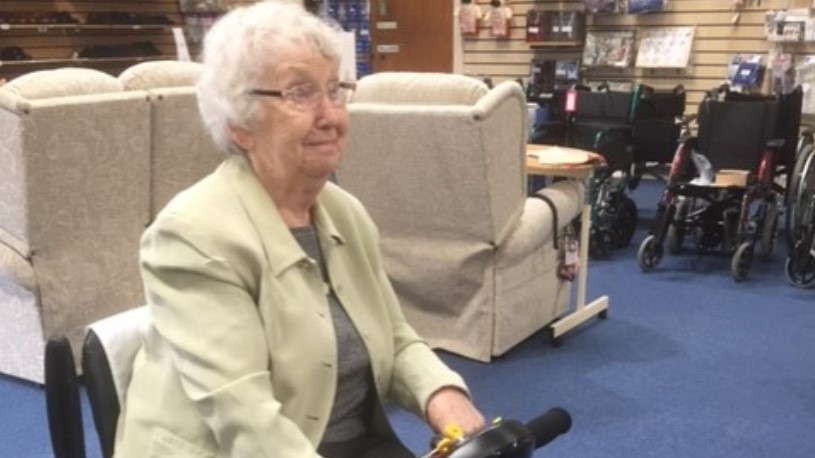 Marion Davis on her mobile scooter when the family bought it in 2017.