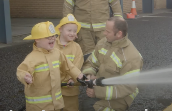 Ollie and Cameron became young firefighters as part of the film.