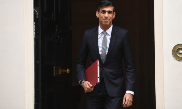 Chancellor of the Exchequer Rishi Sunak departs 11 Downing Street, in Westminster, London, to deliver a summer economic update at the Houses of Parliament in July 2020.