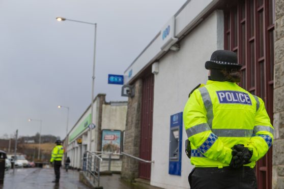 The scene outside the TSB Bank in Kirkcaldy following the armed robbery at the time.