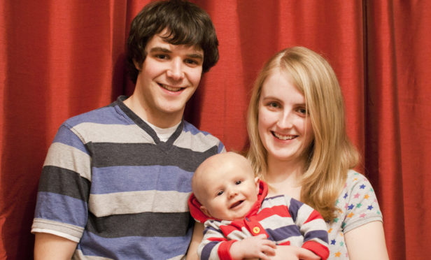 Andy and Jennifer Gill with baby Oliver.