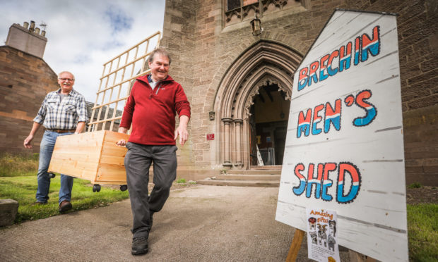 Brechin Men's Shed chairman Bill Pennycook and secretary Gordon Strachan at their base in the old town church.