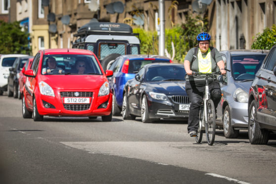 The Courier, CR0022205, Impact news, Jon Brady story. Case study cyclist Heather McKenzie and her eBike - Heather has started cycling for the first time during lockdown. Picture shows; Heather McKenzie and her e-bike. Monday 6th July, 2020. Mhairi Edwards/DCT Media