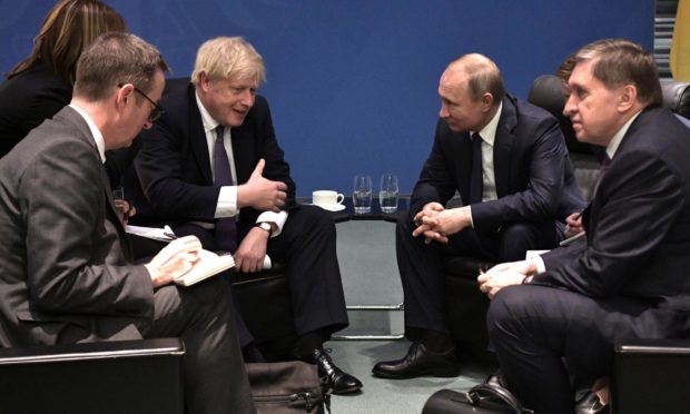 Prime Minister Boris Johnson and Russian President Vladimir Putin in 2019.