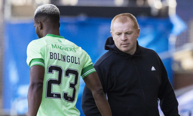 Celtic future of Boli Bolingoli - pictured with Neil Lennon - is in doubt after he broke quarantine rules.