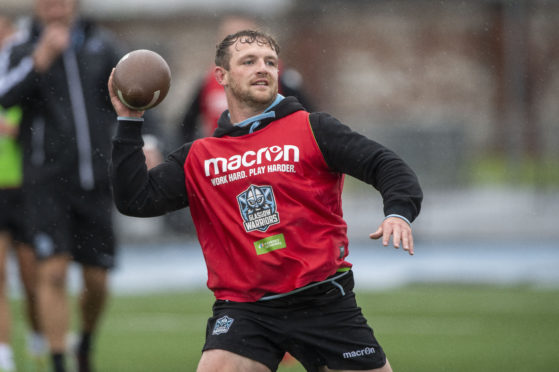 Nick Grigg trying a little American Football in training at Glasgow this week.