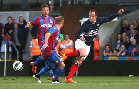 Charlie Adam in action in Julian Speroni's Crystal Palace testimonial in 2015.