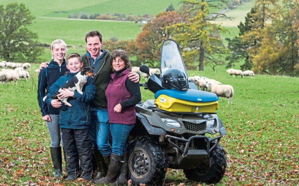 Neil and Debbie McGowan at Incheoch Farm with children Tally, 14, and Angus, 12.