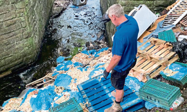 Lanarkshire farmer Davy Shanks faced the disgusting discovery of two tonnes of waste from a meat processing site dumped on his land.  To compound matters, he then had the £2000 bill to clean it up.