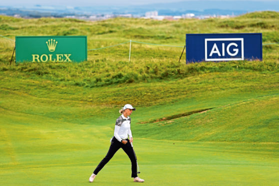 Popov
TROON, SCOTLAND - AUGUST 23: Sophia Popov of Germany celebrates after putting a birdie on the 15th green during Day Four of the 2020 AIG Women's Open at Royal Troon on August 23, 2020 in Troon, Scotland. (Photo by R&A - Handout/R&A via Getty Images)