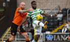 Mark Connolly tussles with Celtic striker Odsonne Edouard.
