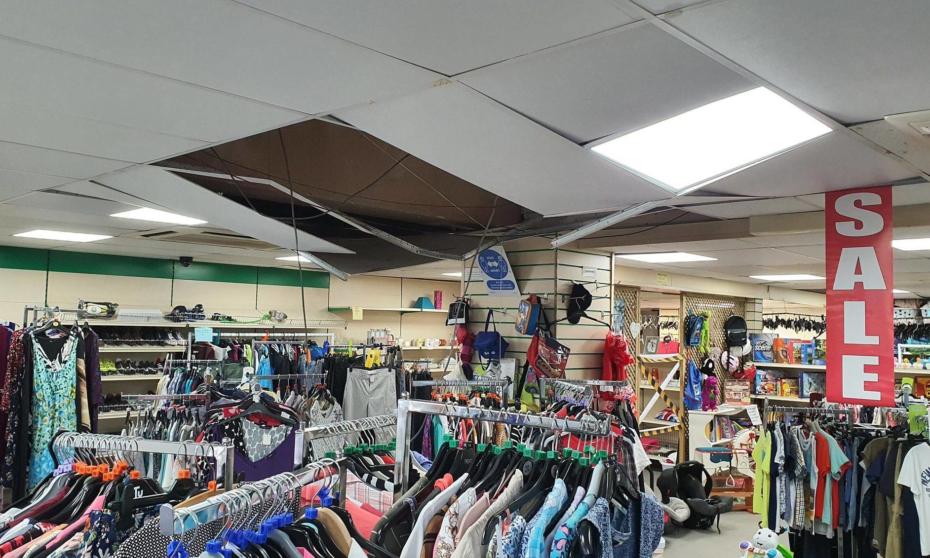 The thieves entered the premises through the roof, causing the ceiling to collapse.