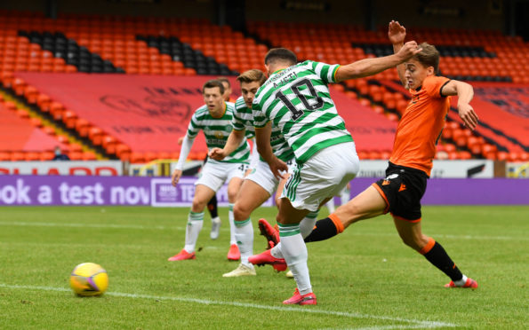 Albian Ajeti nets the winner for Celtic.