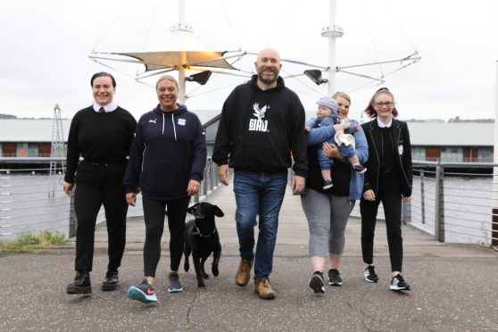 Ahead of their walk on Saturday from the Tay Bridge to the Queensferry Crossing, in aid of Andy's Man Club are from left: April Roberts, Val Lindsay, Ritchie Peter-Tennant, Chez Lesley with baby Lucas-Zak, and Brodie Hamill along with Skip the dog.